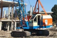Cleaning the drilled soil by crane MKG-25br. Site: Dnipro. 9A Peremogy Embankment. Customer: TOV (limited liability company) Stroitel.