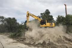 Soil storing by KAMATSU excavator. Site: Levelling of residential buildings.