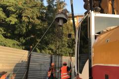 Immersion of the reinforcement frame by the vibrating pile hammer. (CFA). Site: Residential complex on Victory 96. Zaporizhia.